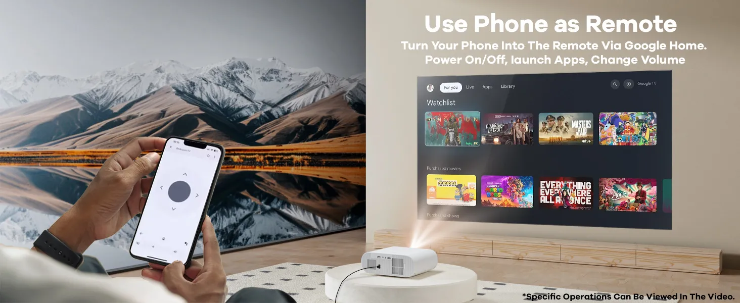Hand holding a phone used as the projector remote via Google Home